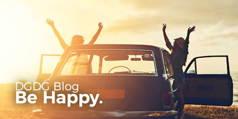 Happy People with Car with a Sunset in the background.